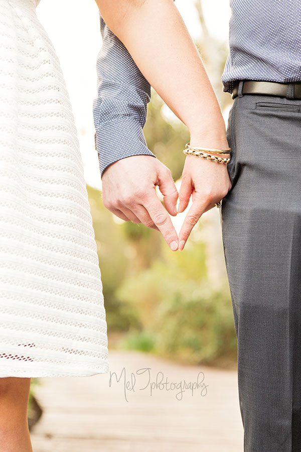 Holding hands engagement photo